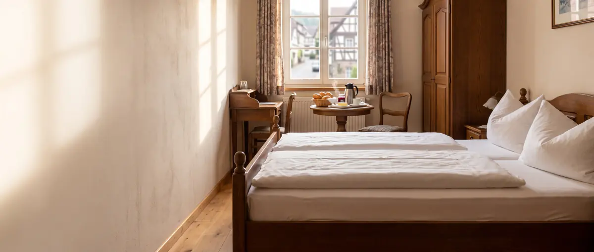 Pensionszimmer mit Frühstück